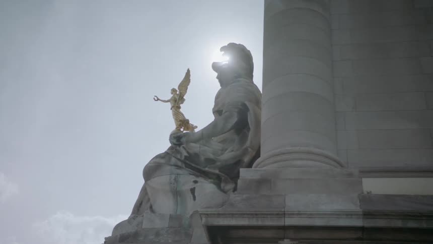 Sunlight shines on a statue