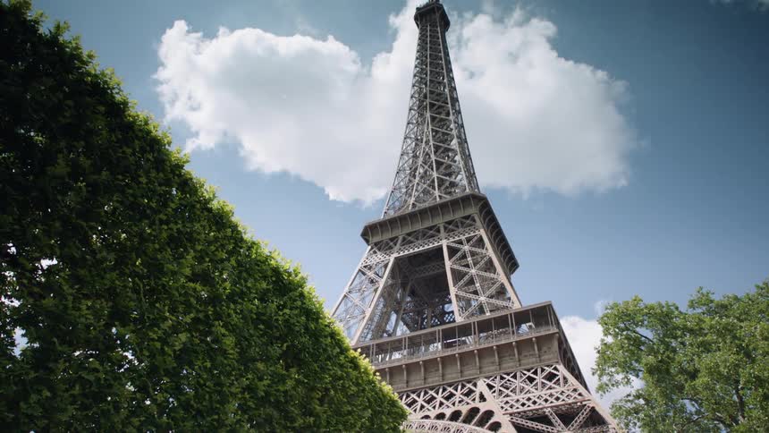 Clouds float above the eiffel tower