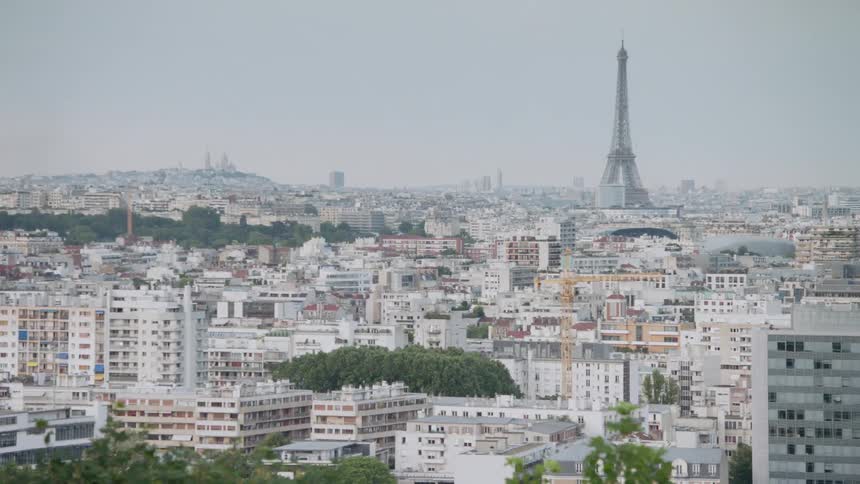 The Eiffel tower is in the background over Paris