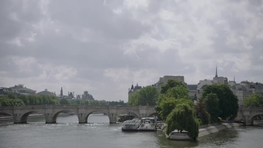 A city bridge spans a river