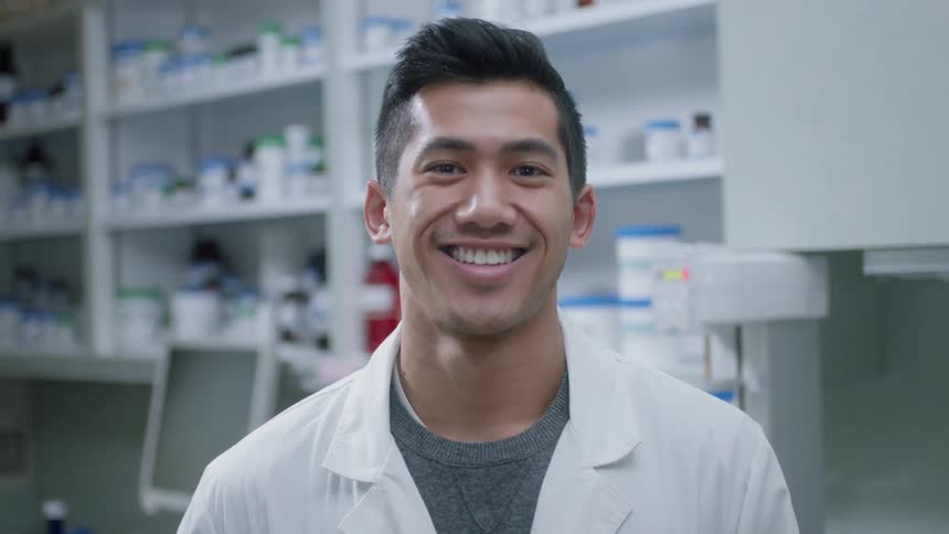 A pharmacist smiles