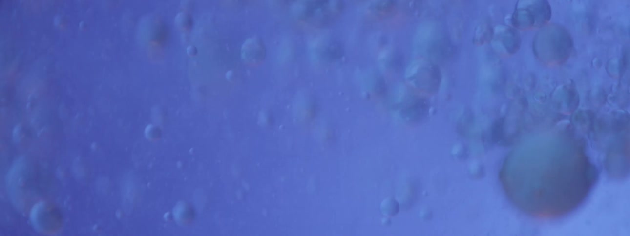 Bubbles are floating and churning in a liquid solution