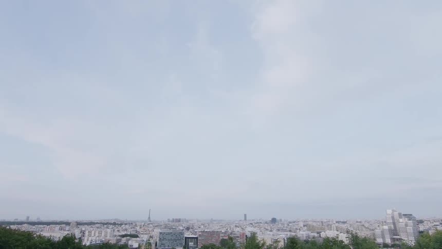 Clouds float over a city