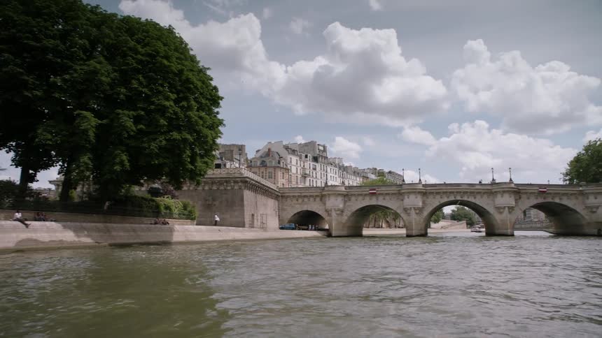 A city bridge spans a river