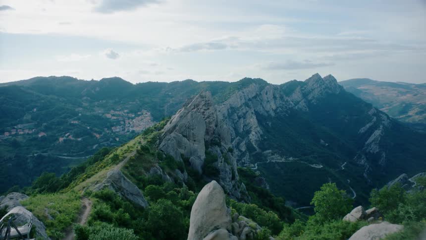Mountain tops seen on a cloudy day near sunset