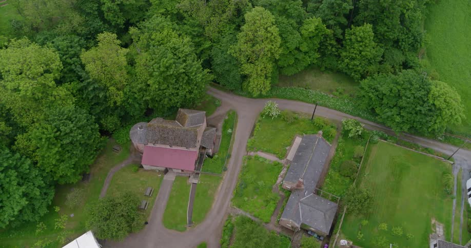 Old farm houses surrounded by trees