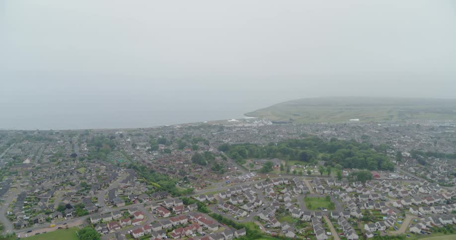 Fog floats over a city