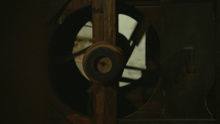 A fan is turning inside of a machine