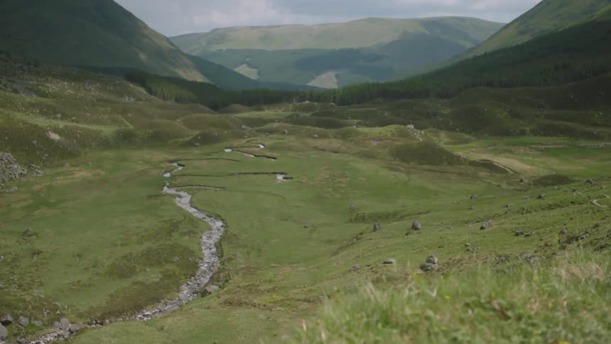 A river flows through a mountain valley