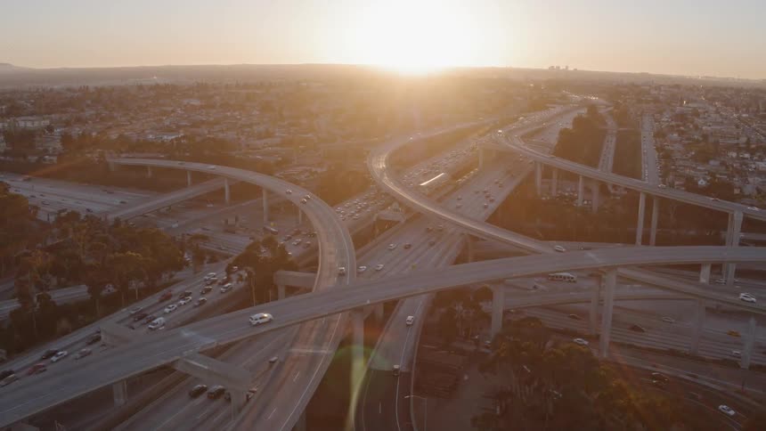 Vehicles travel on a busy highway