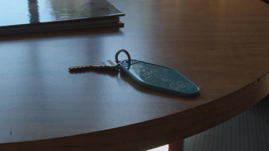 A hotel key on a desk
