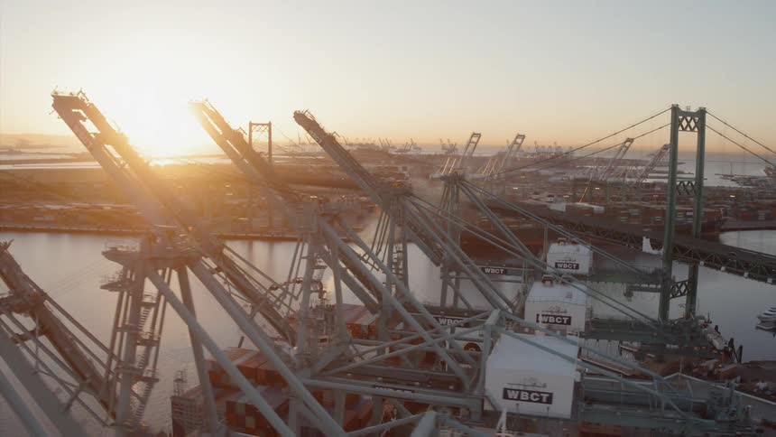Large cranes tower on the dock