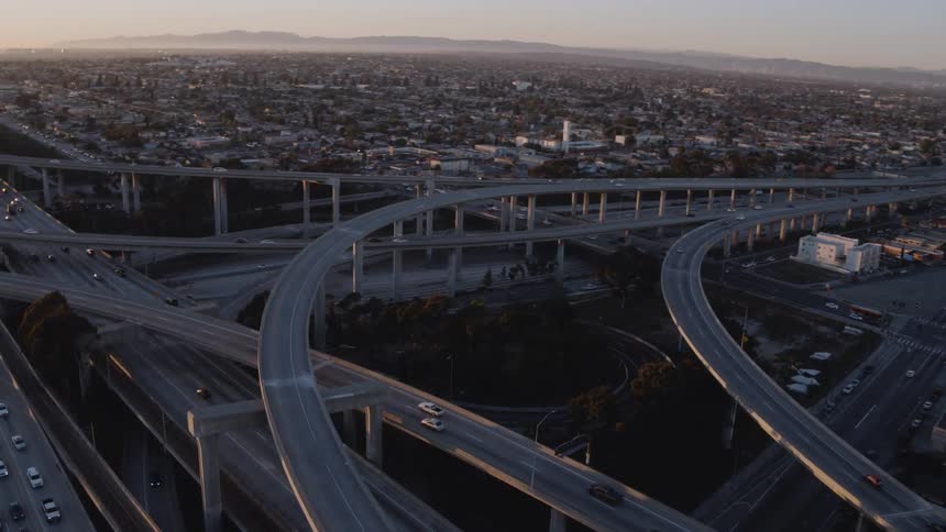 Vehicles travel through a maze of highway roads