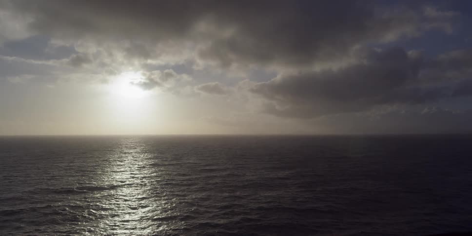 The sun shines over the sea