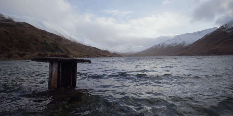 Wood structure in a mountain lake