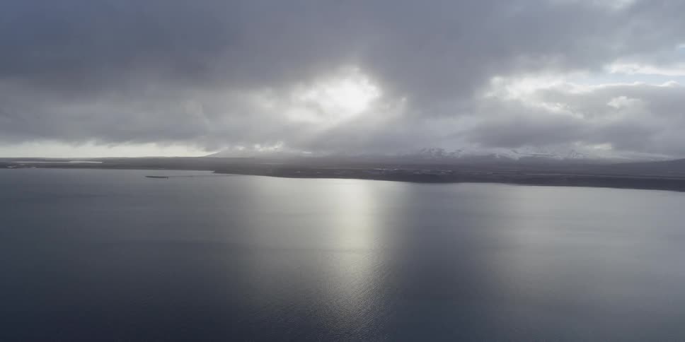 Clouds gather over the sea shore