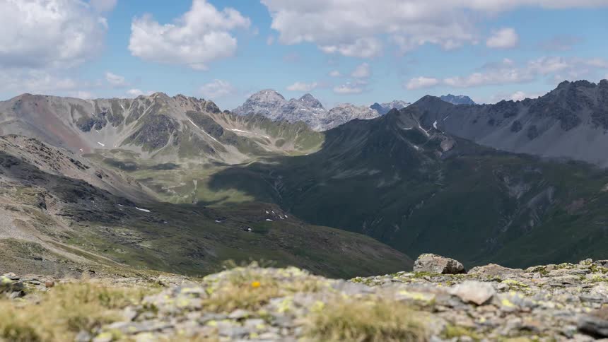 Clouds pass over a mountain range