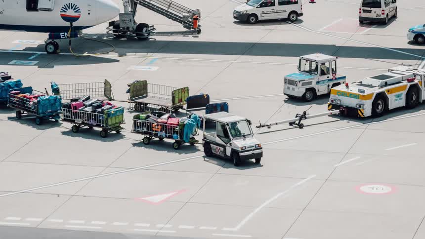 People work moving around the runway