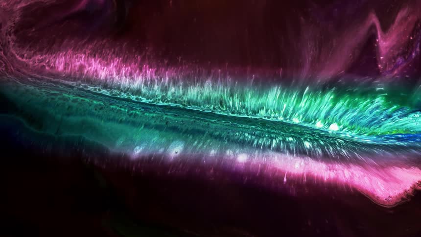 Waves of purple close in on a stream of green