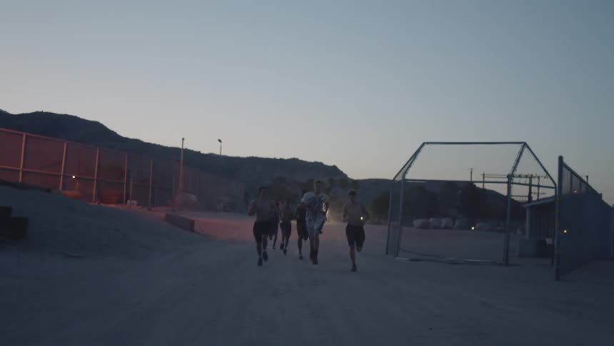 People running in a field