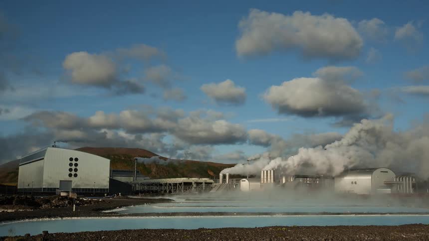 Clouds float over a factory