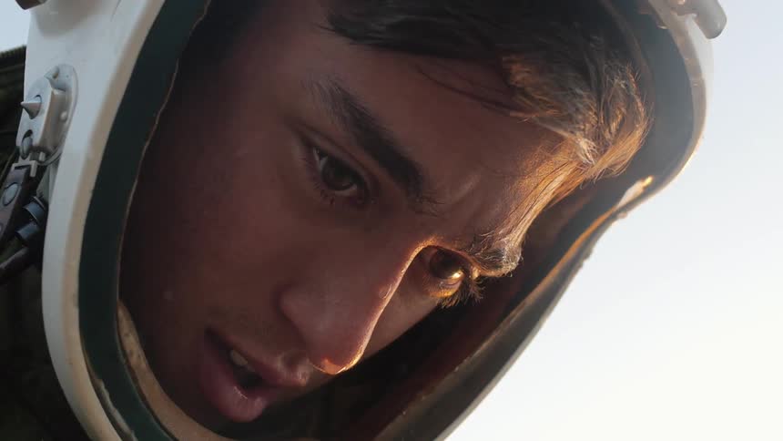 Close up of a man wearing a helmet