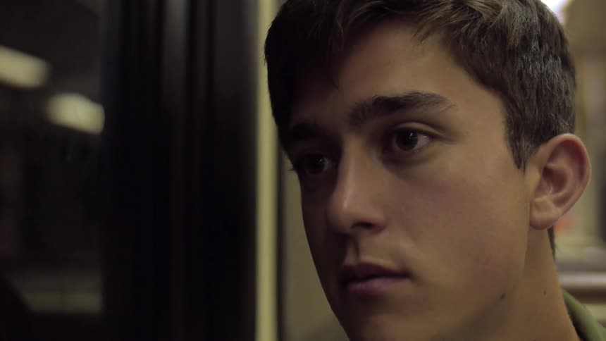A  person staring out of a window