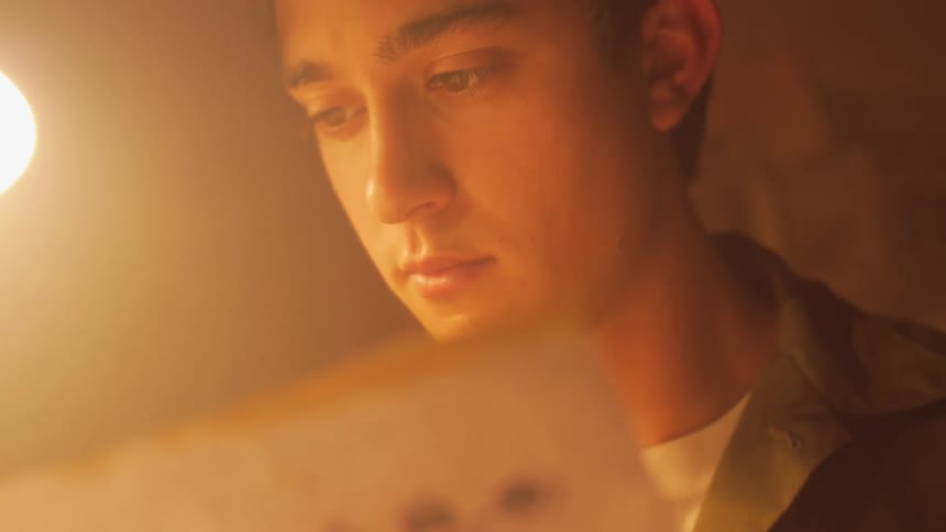 A person looking down at something