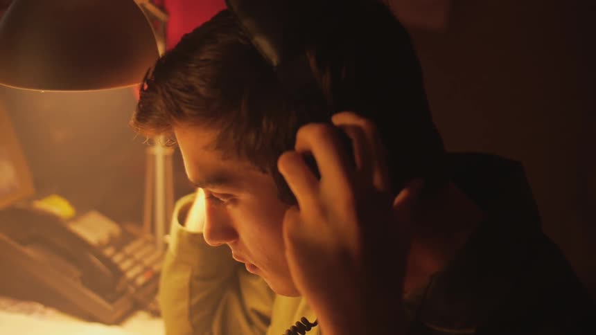 A person putting on a headset