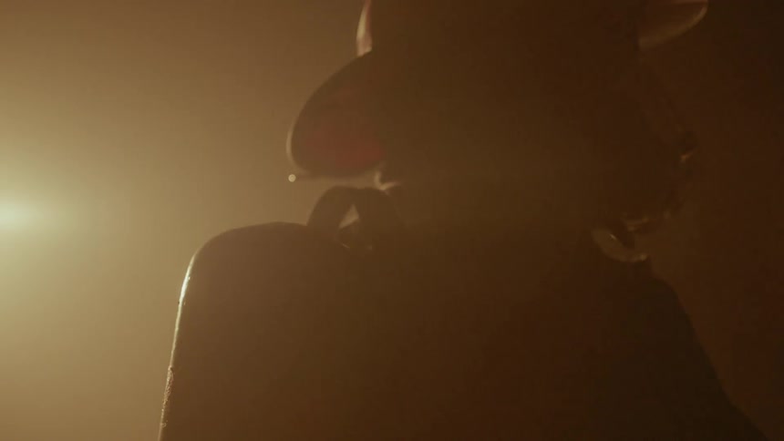 A firefighter is wearing his uniform at night