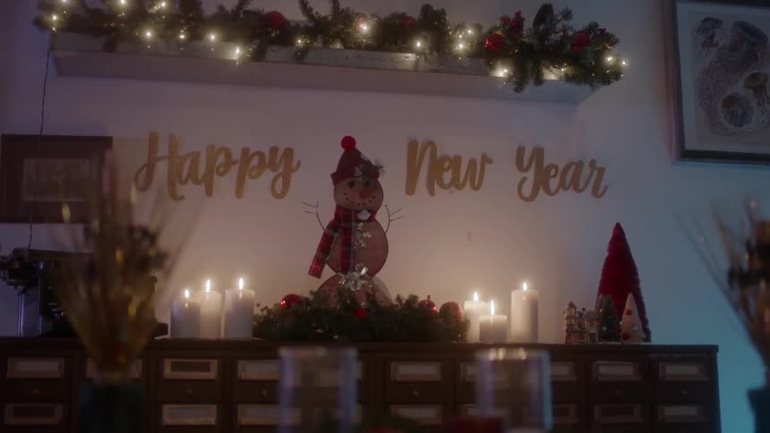 Christmas decorations sit on a table