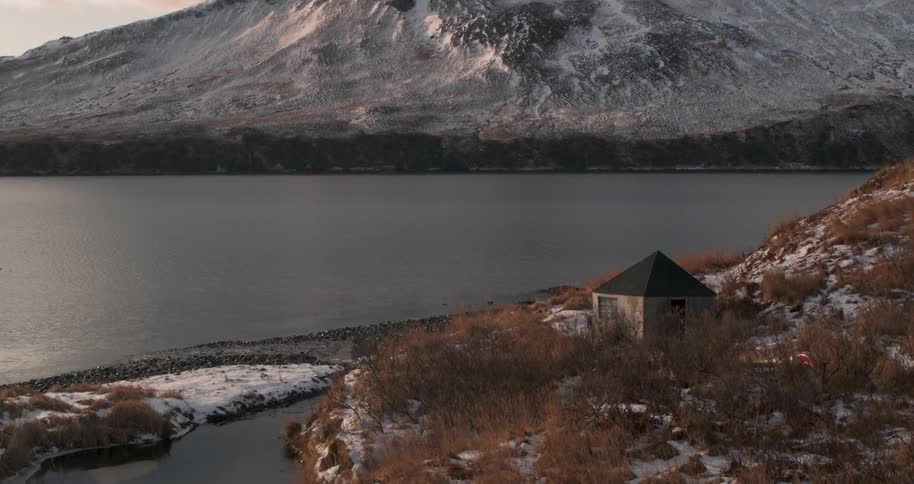 A cabin on the coast on a winter day