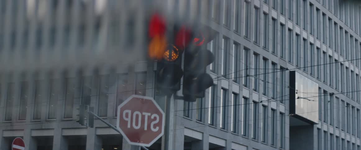 Traffic light and stop sign in an urban area