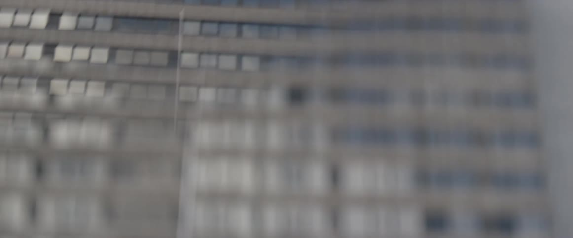 City buildings seen through a window
