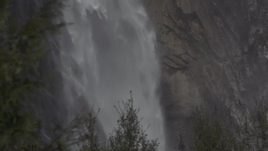 A waterfall rolling down a cliff side