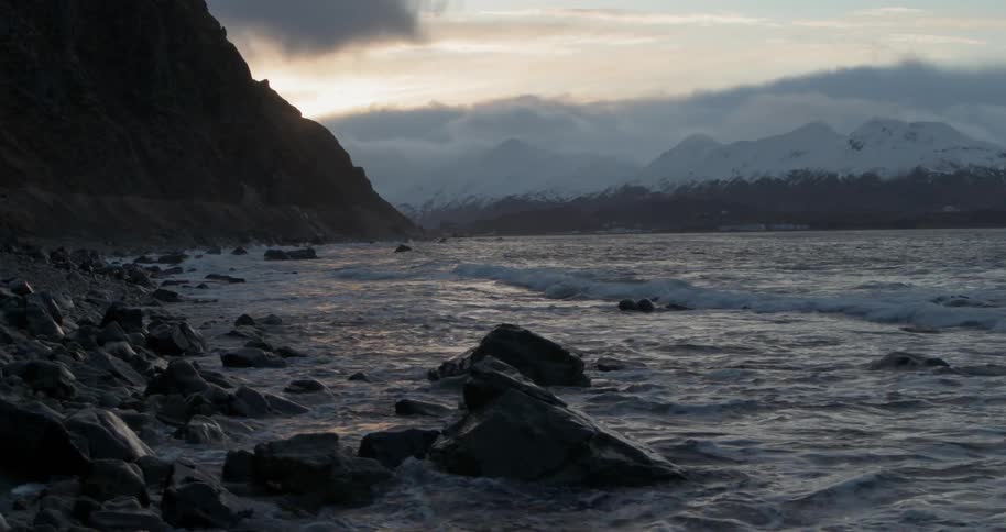Waves roll onto a rocky shore