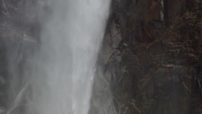 A waterfall rolling down a cliff side