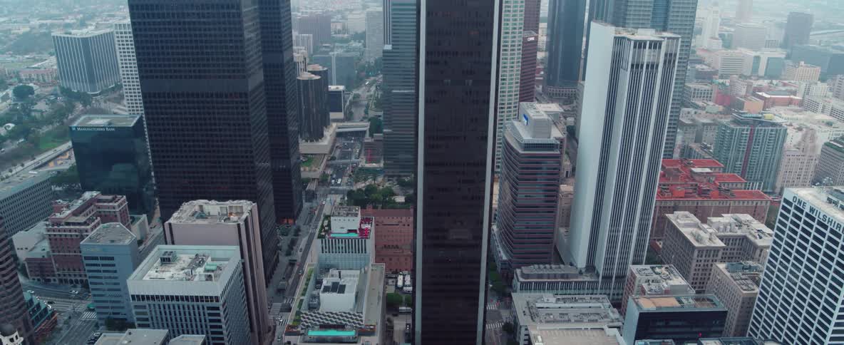Skyscrapers standing in a large city on a hazy day