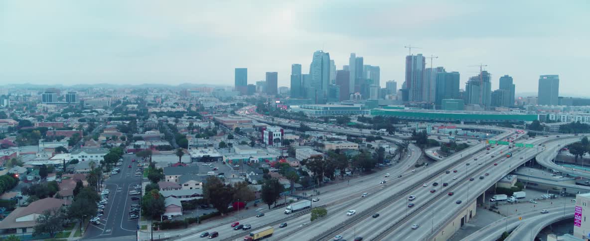 Cars drive on a city highway