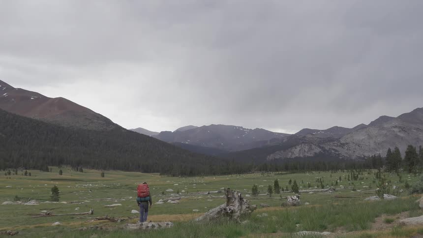 A person wearing a backpack