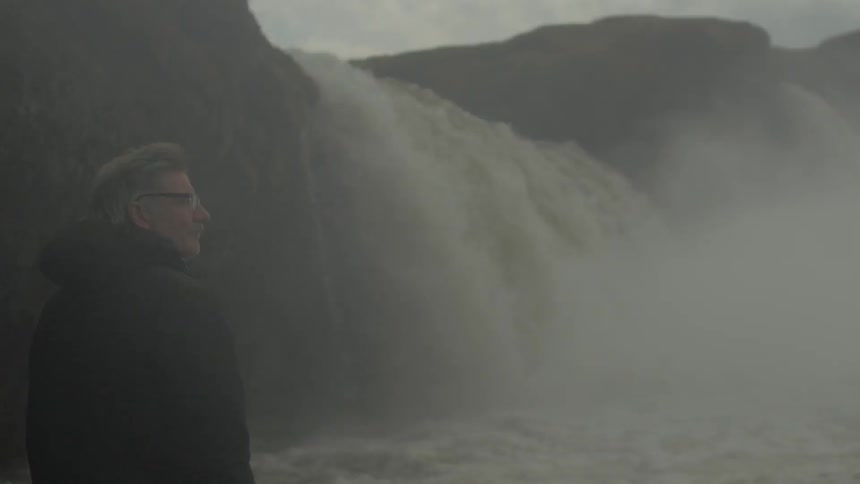 A waterfall rolling down a cliff side