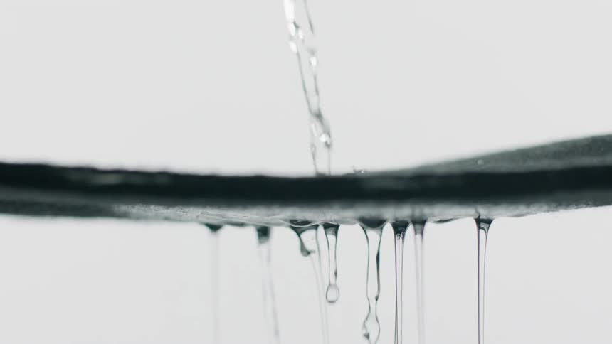 Liquid is being poured onto a strainer