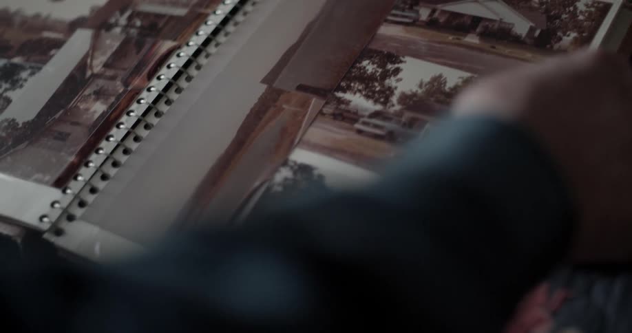 A person looks at a photo album