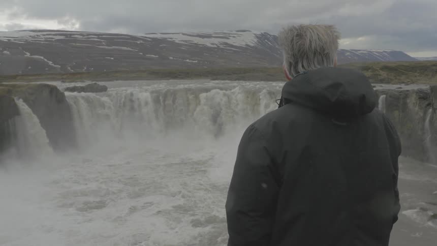 A waterfall rolling down a cliff side