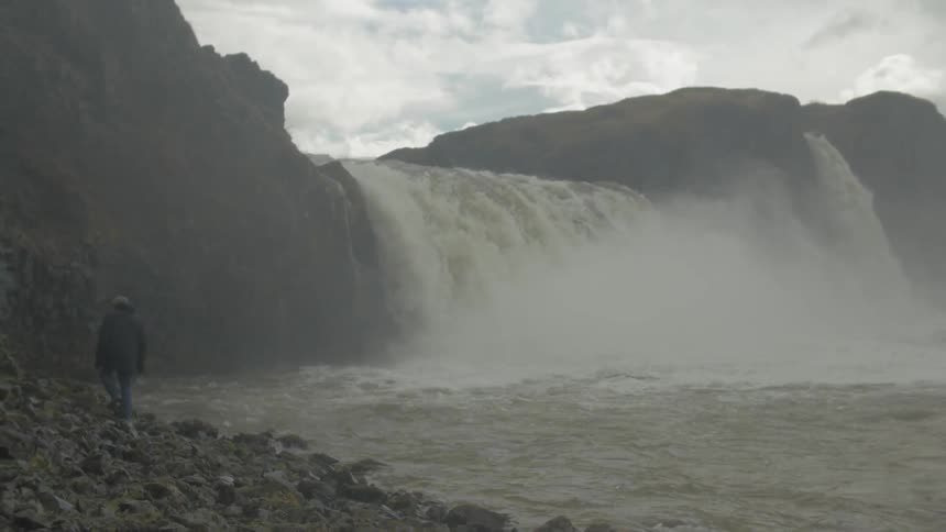 A waterfall rolling down a cliff side