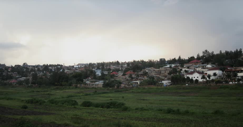 A neighborhood is shown at sunrise