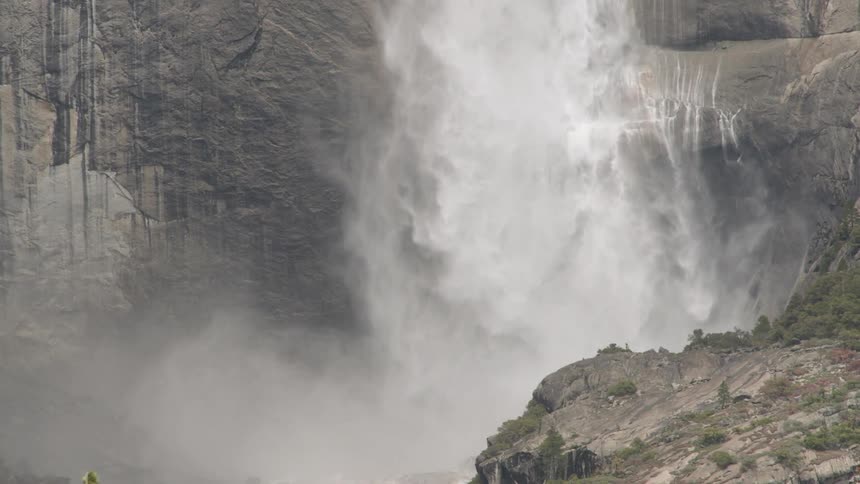 A waterfall rolling down a cliff side