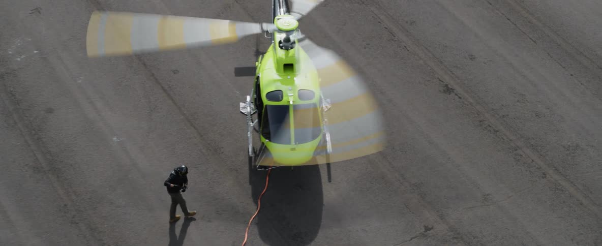 Man approaches helicopter