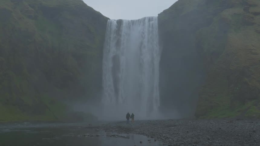 A waterfall rolling down a cliff side