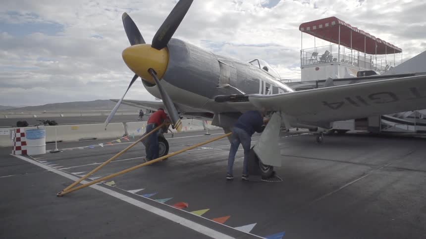 People working on an airplane